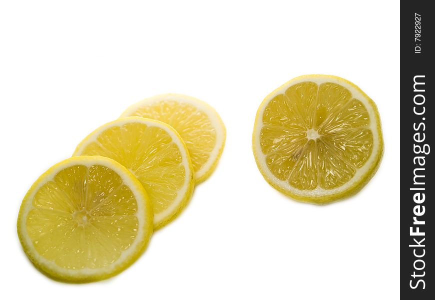 Photo of lemon slice fruit and one half