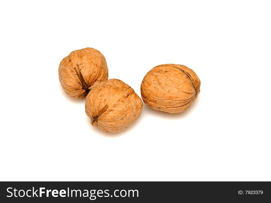 Walnuts against on white background