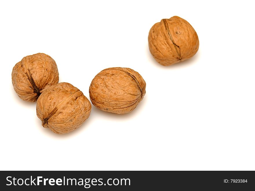 Walnuts against on white background