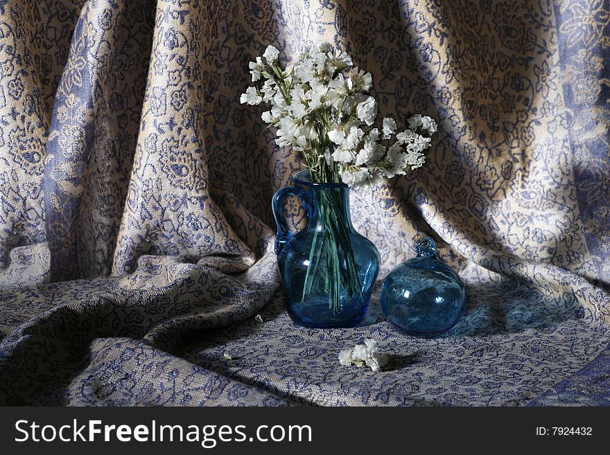 Still-life with old a blue jug and a sphere. Still-life with old a blue jug and a sphere