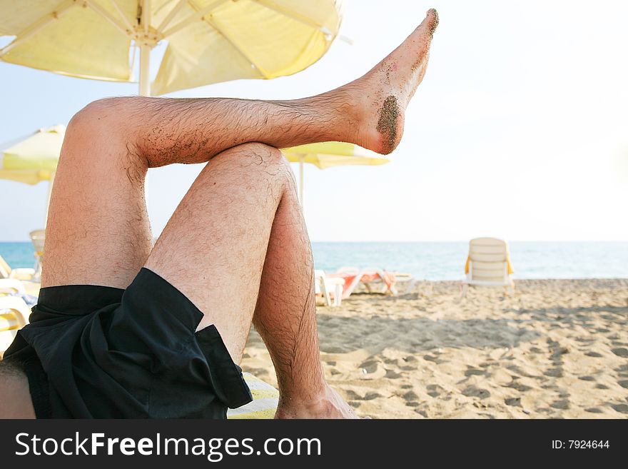 Sunbathing on the summer beach. Sunbathing on the summer beach