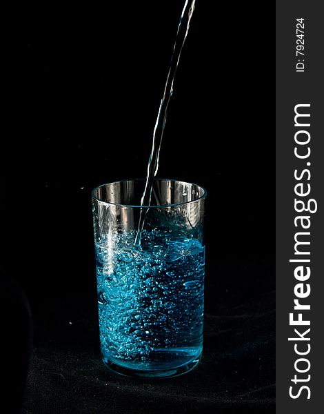 Glasse with drink.  Isolated on a black background