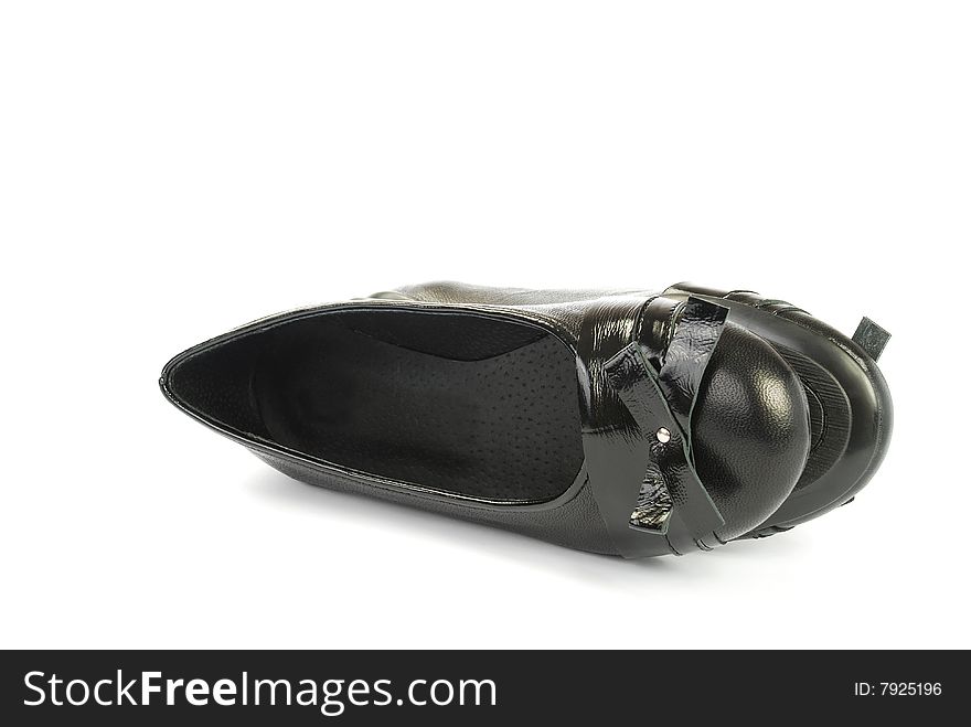 Black womanish shoes on a white background