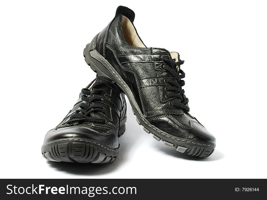 Black masculine shoes on a white background. Black masculine shoes on a white background