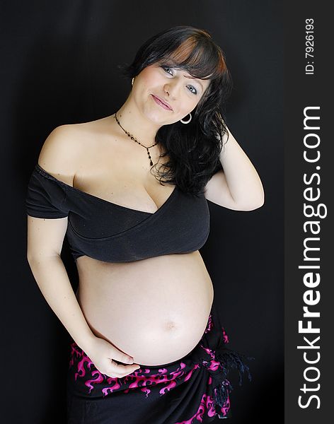Pregnant woman Happy for have a child soon with Black Background