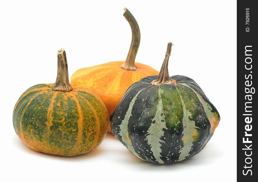 Three fancy pumpkins isolated over white