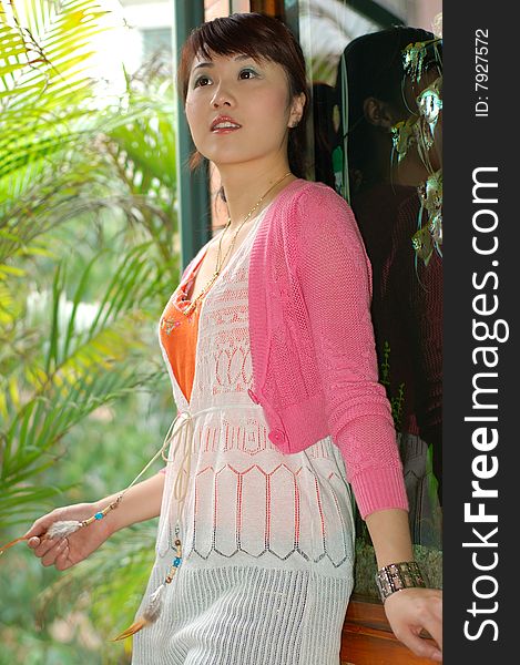 A  beautiful Young girl  standing indoor,from china. A  beautiful Young girl  standing indoor,from china