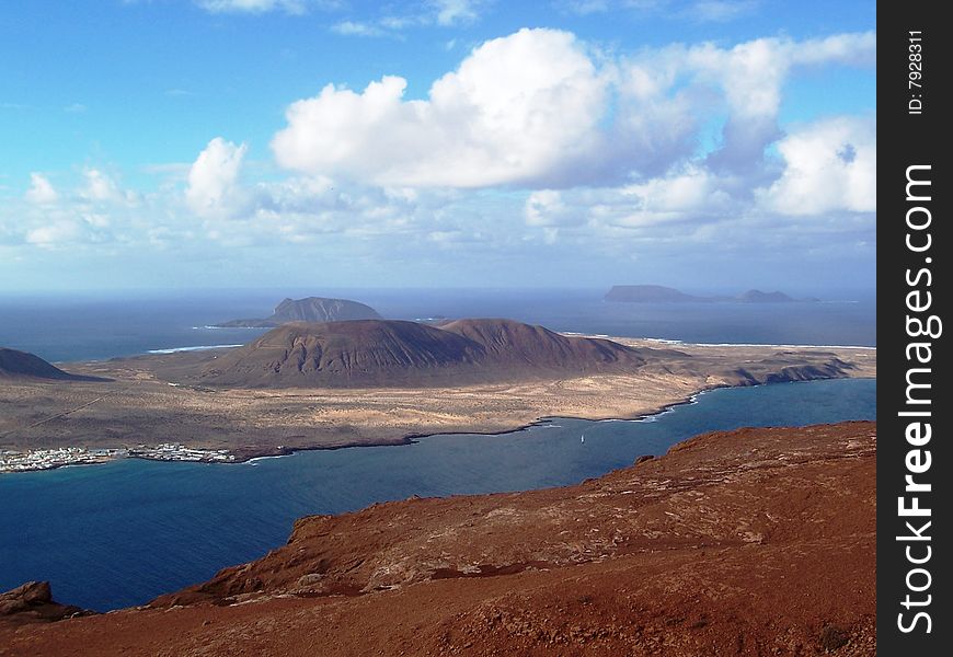 View of smaller volcanic Canary Islands off northwest tip of Lanzorote