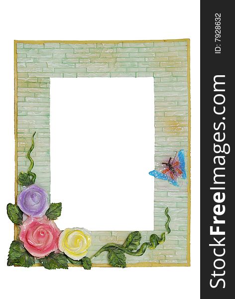 Photoframework in the form of a bricklaying and decorated with colours from roses. Photoframework in the form of a bricklaying and decorated with colours from roses