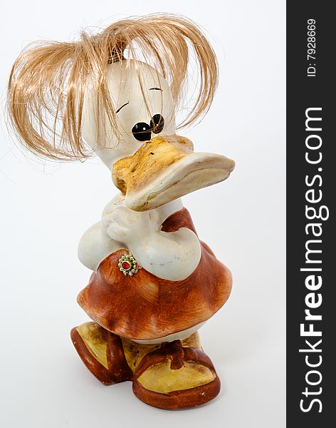 Funny hand-made ceramic duck figure on white. Funny hand-made ceramic duck figure on white