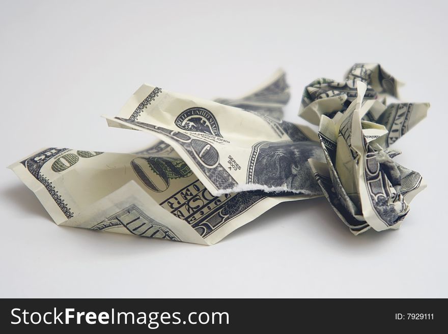 Torn Dollar bills lying in heap. Torn Dollar bills lying in heap