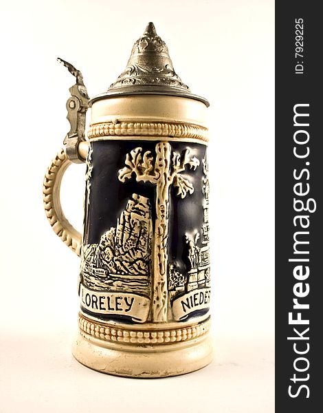 Medieval beer cup with metal cover and drawings. Medieval beer cup with metal cover and drawings