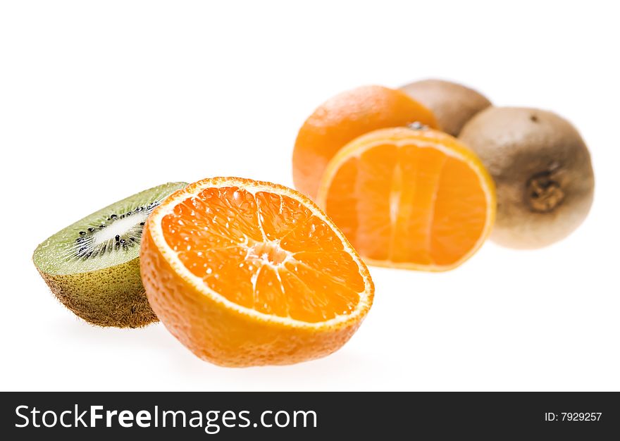 Kiwi and tangerine isolated on white background