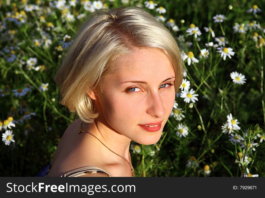 Young Woman in daisy field. Young Woman in daisy field