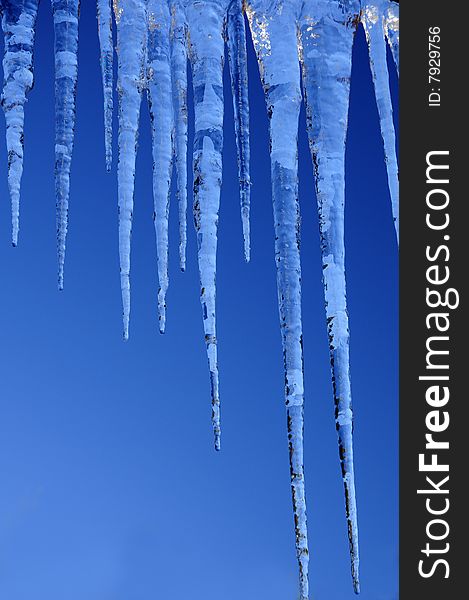 Beautiful icicles against a backdrop of the sky. Beautiful icicles against a backdrop of the sky