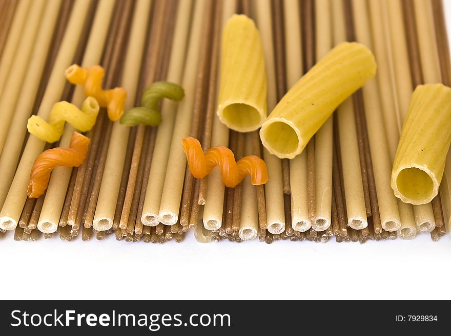 Colorful noodles frame on a white background. Colorful noodles frame on a white background