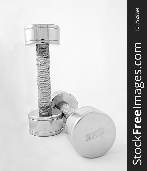 Studio photo of silver barbell