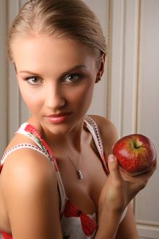 Attractive Young Woman Holding Red Apple Stock Photo