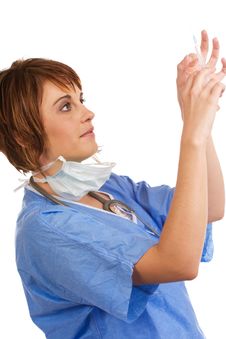 Female Doctor Tapping Filled Syringe Royalty Free Stock Photos Female Doctor Tapping Filled Syringe Royalty Free Stock Photos