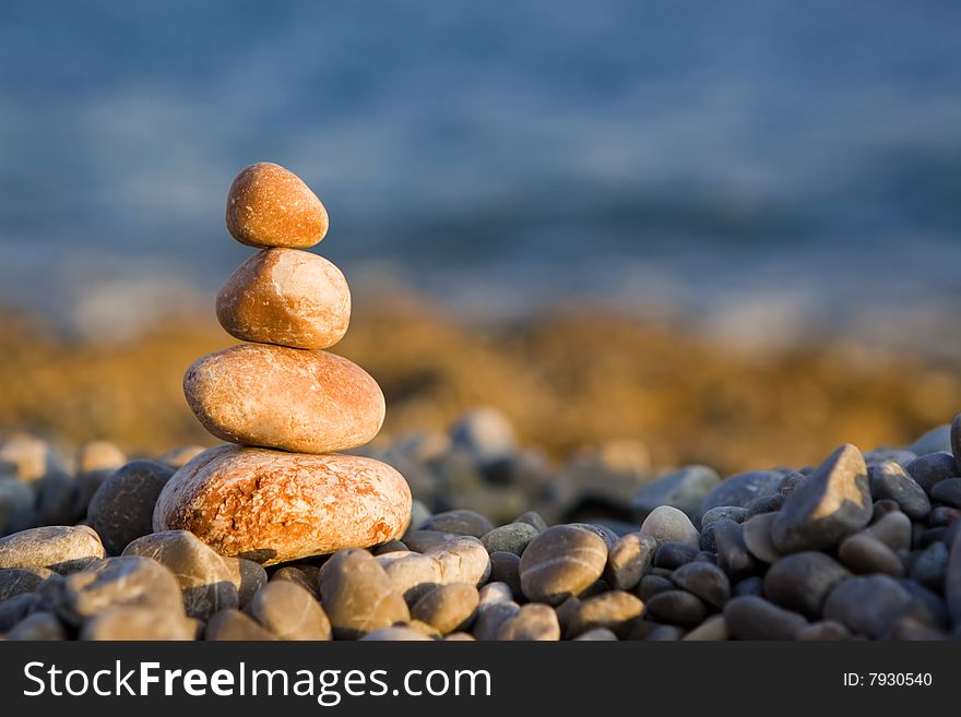 Balanced Stones On Sea