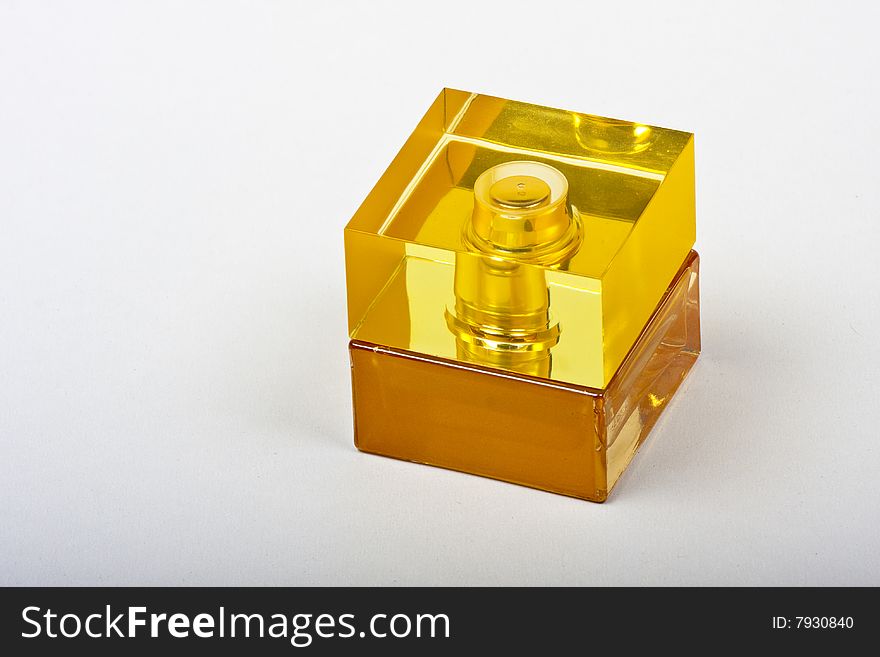 Bottle of perfume, cube shaped. Bottle of perfume, cube shaped