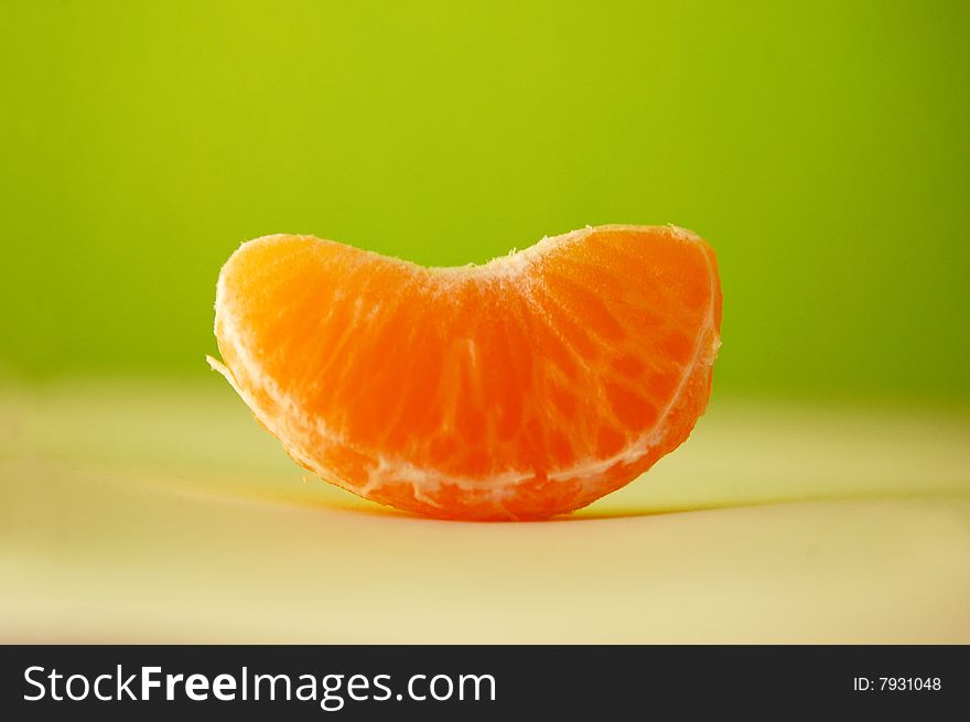 Fresh mandarine in green and white background