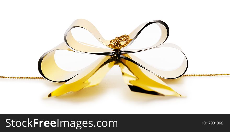 Gold bow isolated on white background
