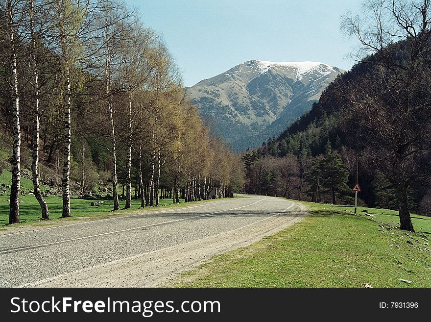 Mountain road along the Zelenchuk river on the Northern Caucasus. The picture was taken on May, 2004.