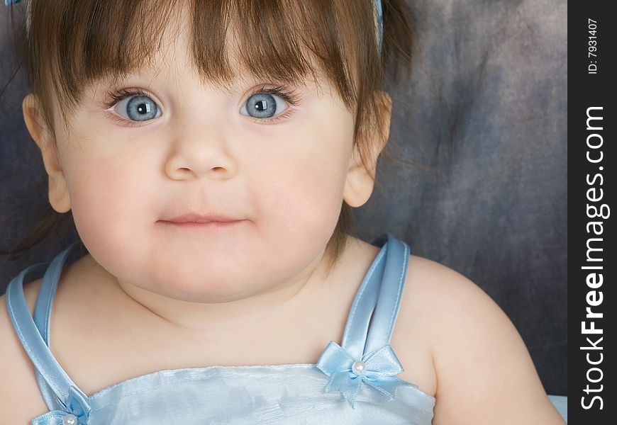 Portrait of blue eyed toddler
