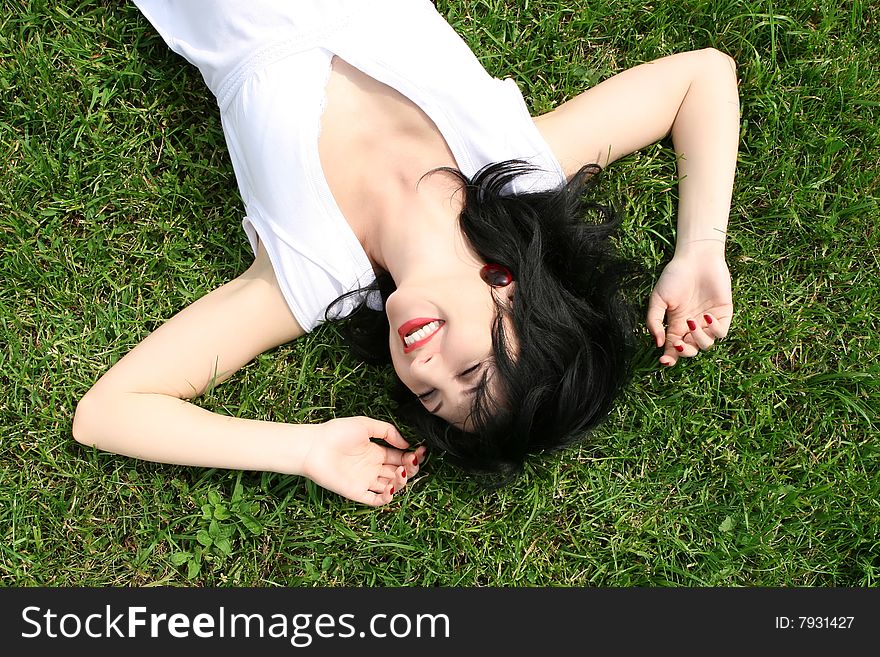 Sweet woman rest on the grass