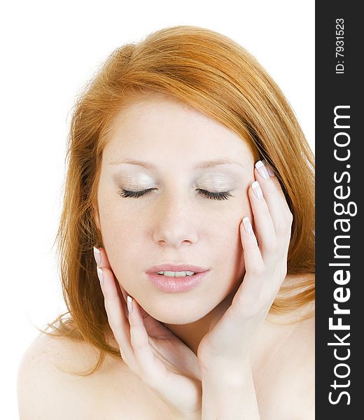 Sensual portrait of a girl with closed eyes and hands near face isolated on white