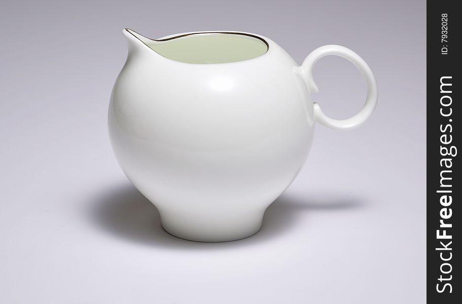 Russian fine china white milk jug with a golden rim