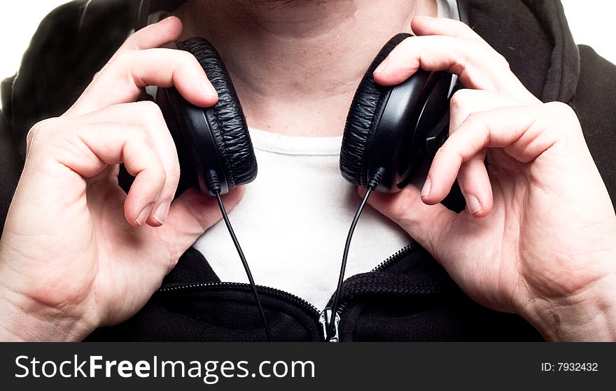 Youth with headphones around neck. Youth with headphones around neck