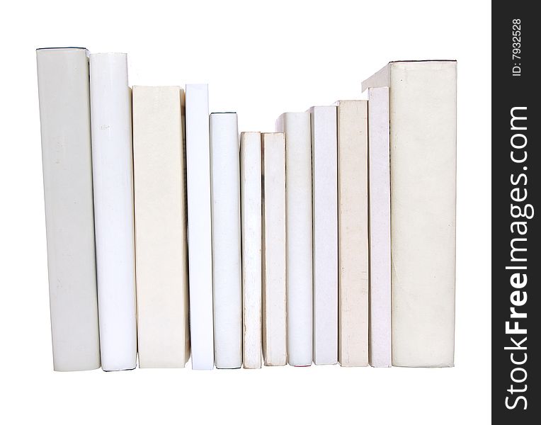 Row of white books with one red book isolated on a white background