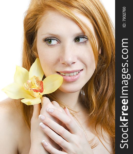Girl with an orchid at hands isolated on white. Girl with an orchid at hands isolated on white