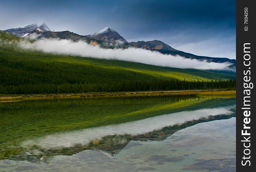 Reflection of Canadian Rockies in crystal clear lake. Reflection of Canadian Rockies in crystal clear lake