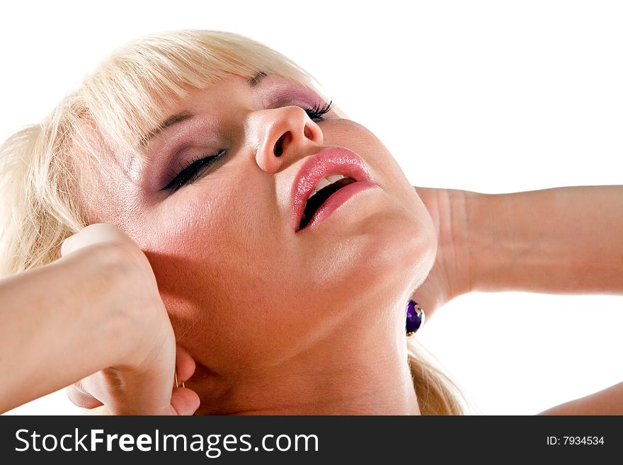Isolated close up portrait of lovely blond woman with closed eyes