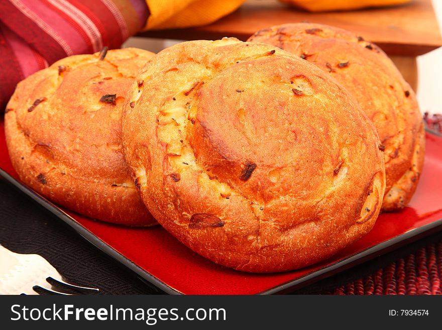 Plate of onion rolls in a plate.