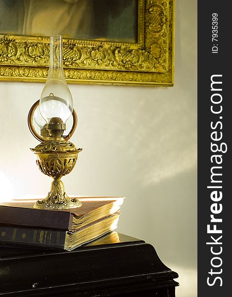 Old things in sunlight, lamp, books, ferniture, picture. Old things in sunlight, lamp, books, ferniture, picture