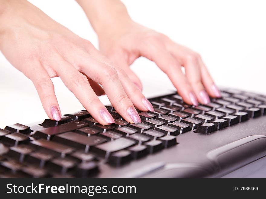 Close-up of woman�s hand touching computer keys