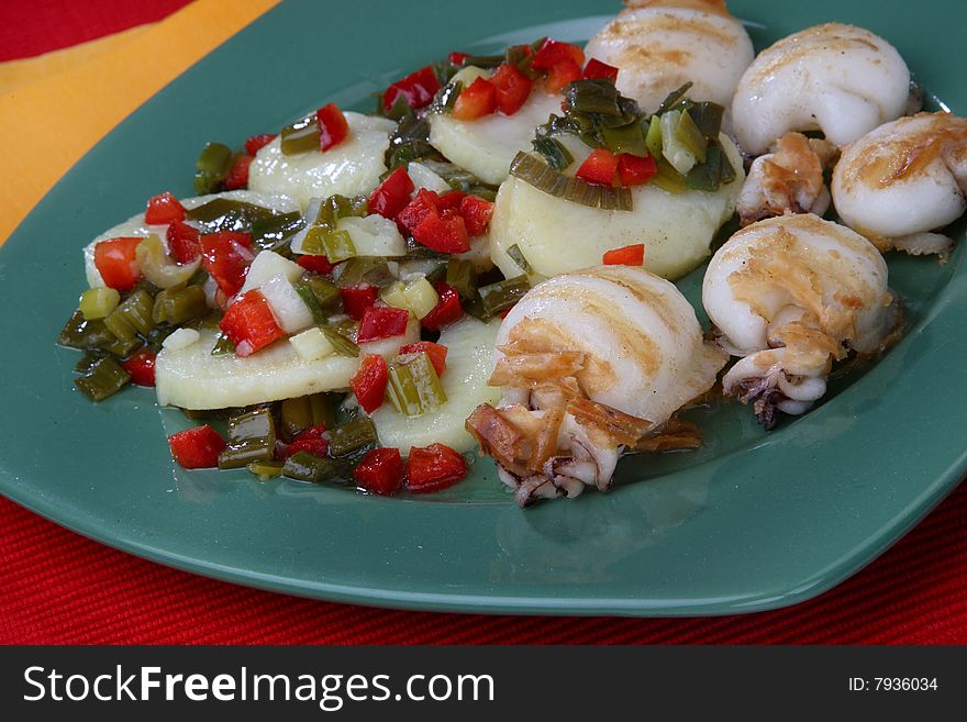 Grilled meat with mixed vegetables on plate