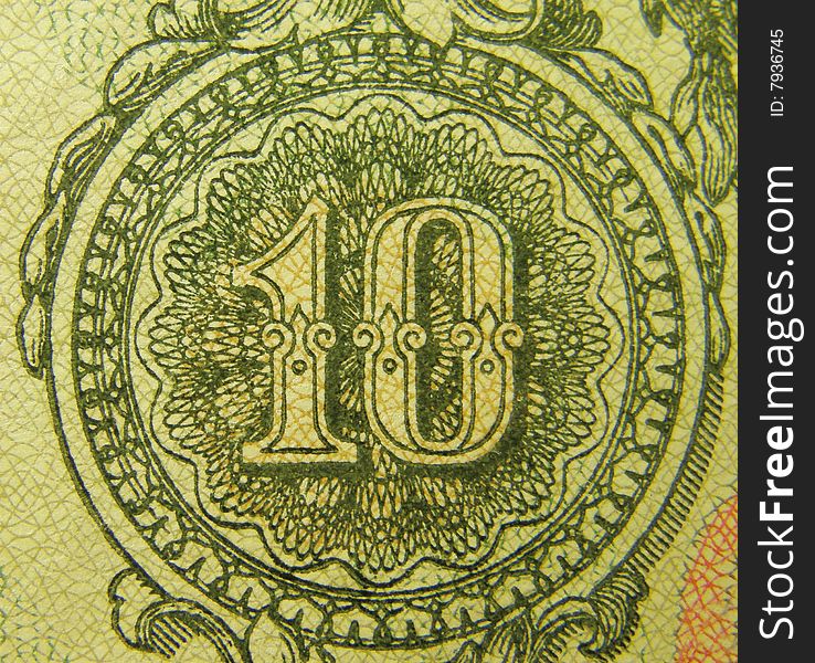 Ten on the fragment of old banknotes