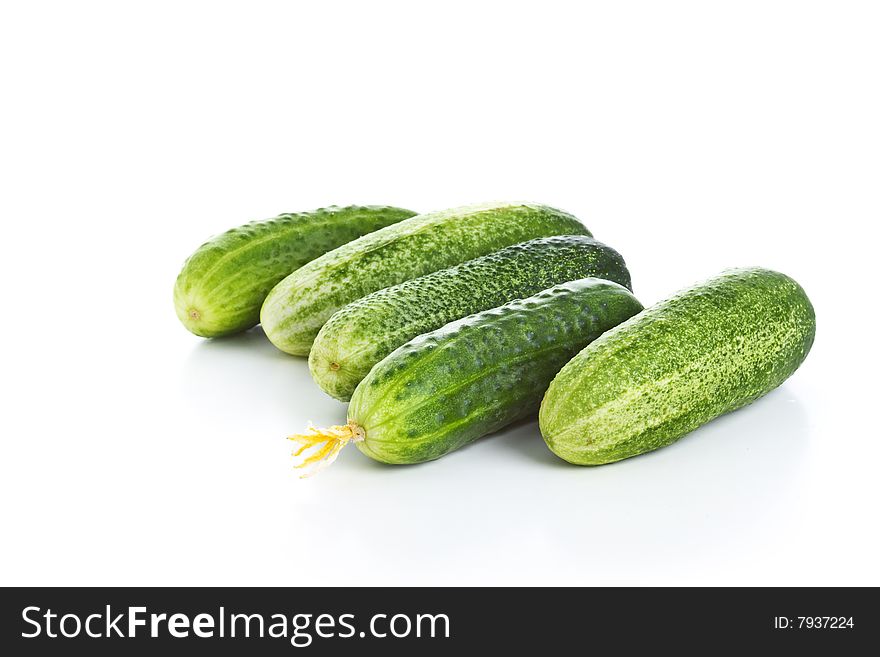 Fresh cucumbers isolated over white. Fresh cucumbers isolated over white