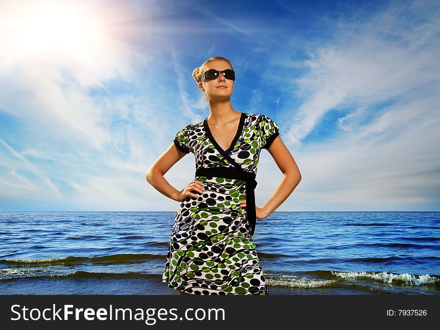 Woman Relaxing Near The Ocean