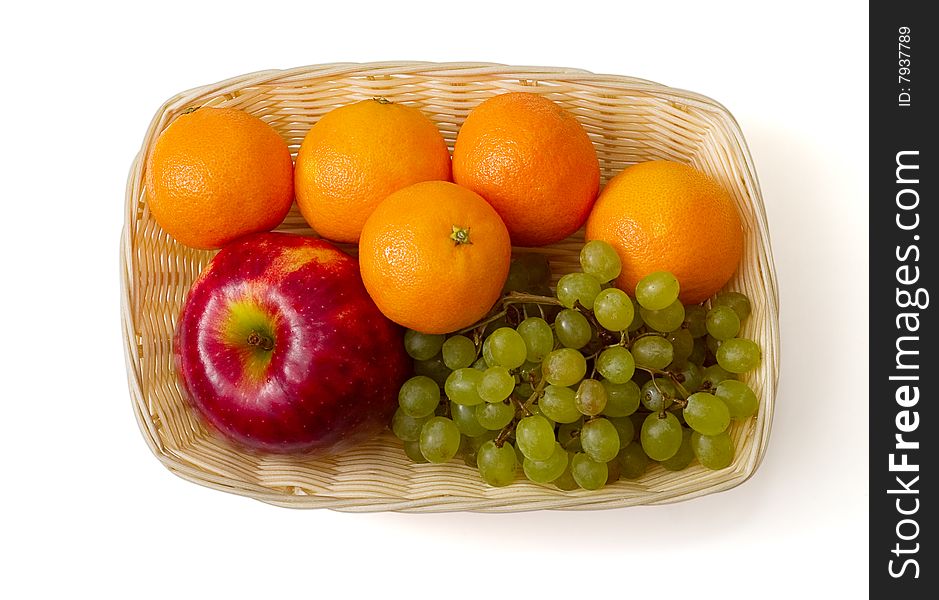 Fruit in the basket on white background. The image contains clipping path.