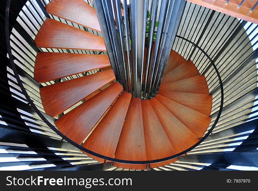 Top view of spiraling wooden stairs. Top view of spiraling wooden stairs