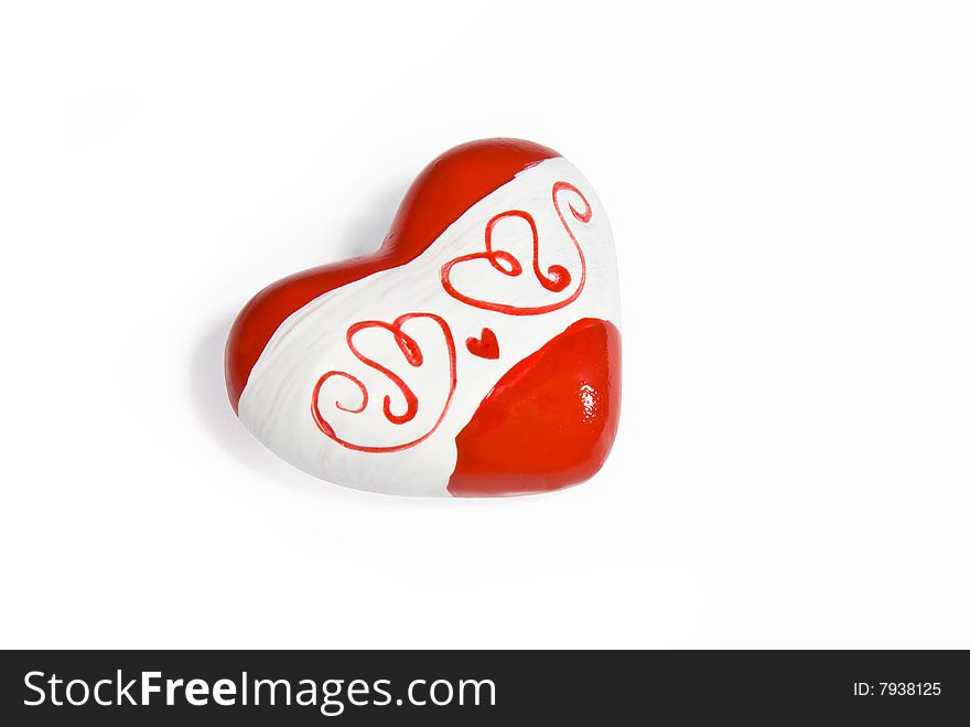 Ceramic heart with a pattern isolated on white background (+clipping path for easy background removing if needed)