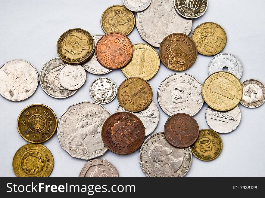 Various textured vintage coins isolated on white