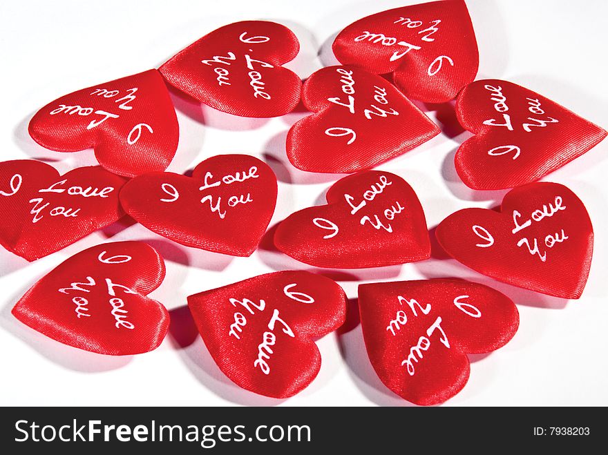 Red hearts on white background