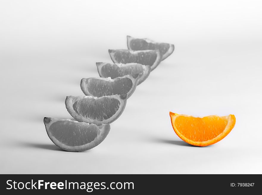 A slice of sweet orange with leadership concept. A slice of sweet orange with leadership concept